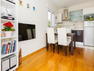 Kuchyň nebo kuchyňský kout v ubytování La Vita e Bella Apartment