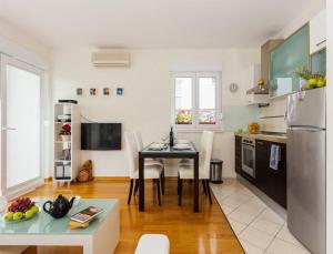 Kuchyň nebo kuchyňský kout v ubytování La Vita e Bella Apartment