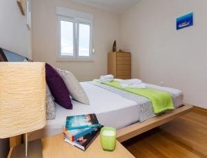 Postel nebo postele na pokoji v ubytování La Vita e Bella Apartment