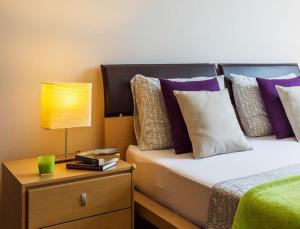 Postel nebo postele na pokoji v ubytování La Vita e Bella Apartment