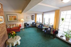 Ein Sitzbereich in der Unterkunft Mein Vierjahreszeiten Hotel Garni Superior