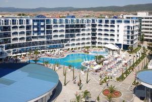 an aerial view of a hotel with a swimming pool at Chaika Beach Resort in Sunny Beach +25 photos