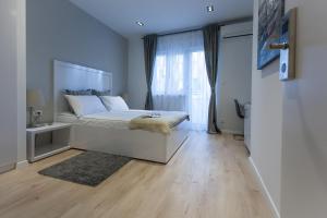 Postel nebo postele na pokoji v ubytování Priuli Luxury Rooms