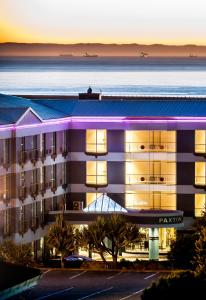 a large building with a large window in front of it at Paxton Hotel in Port Elizabeth