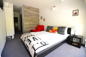 Postel nebo postele na pokoji v ubytování Hotel Biscuit