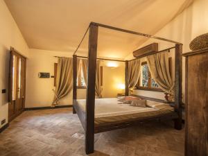 Säng eller sängar i ett rum på Resort La Ghiaia