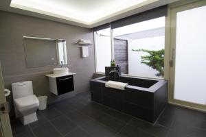 Koupelna v ubytování Kenting Xia Ye B&B + 37 fotografií
