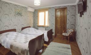 Postel nebo postele na pokoji v ubytování Casa de Khasia