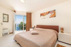 Posteľ alebo postele v izbe v ubytovaní Luxury penthouse Prestige near the sea