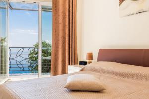 Posteľ alebo postele v izbe v ubytovaní Luxury penthouse Prestige near the sea
