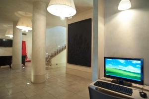 TV a/nebo společenská místnost v ubytování Hotel Residence Stella del Mare