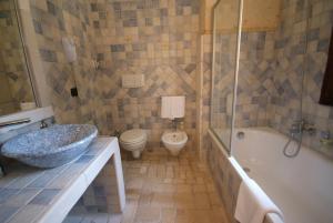 Vannituba majutusasutuses UNA HOTELS Regina Bari