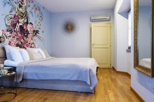 Posteľ alebo postele v izbe v ubytovaní Lora Luxury House