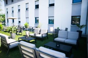 Khu vực ghế ngồi tại All Suites Besançon