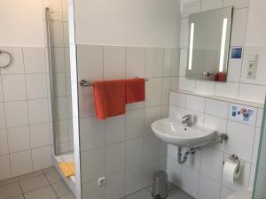 Ein Badezimmer in der Unterkunft Hotel Restaurant Alt Laubach