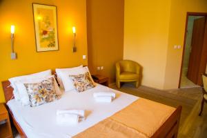 Posteľ alebo postele v izbe v ubytovaní Hotel Pine