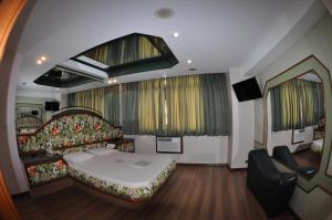 Postel nebo postele na pokoji v ubytování Hotel Barão do Flamengo (Adult Only)