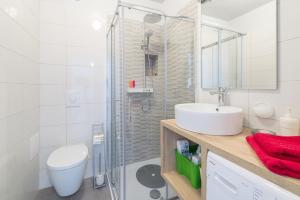 Koupelna v ubytování FM Apartments