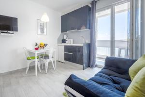 Kuchyň nebo kuchyňský kout v ubytování FM Apartments