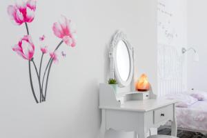 Postel nebo postele na pokoji v ubytování FM Apartments