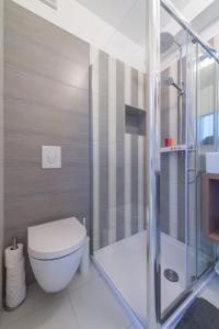 Koupelna v ubytování FM Apartments + 37 fotografií
