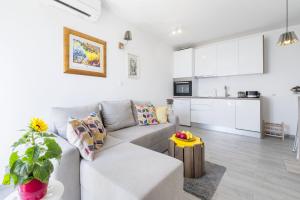 Kuchyň nebo kuchyňský kout v ubytování FM Apartments