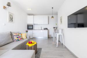 Kuchyň nebo kuchyňský kout v ubytování FM Apartments