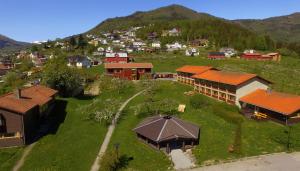 an aerial view of a village with buildings and a mountain at Sogndal Bed & Breakfast in Sogndal
