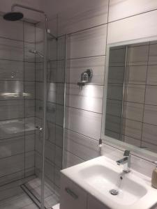 Kúpeľňa v ubytovaní Apartamenty Blisko Plaży Podczele