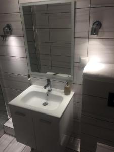 Kúpeľňa v ubytovaní Apartamenty Blisko Plaży Podczele