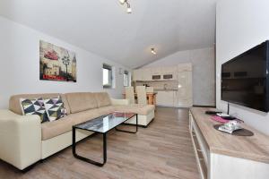 Kuchyň nebo kuchyňský kout v ubytování Apartmani Iva