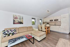 Kuchyň nebo kuchyňský kout v ubytování Apartmani Iva