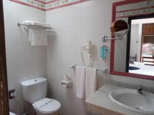 Koupelna v ubytování Hostal Gran Capitan