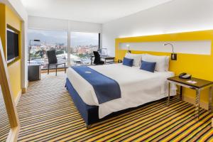 Postel nebo postele na pokoji v ubytování Wyndham Bogota + 37 fotografií