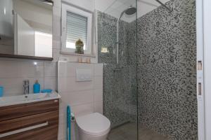 Koupelna v ubytování Apartments Radica