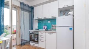 Kuchyň nebo kuchyňský kout v ubytování Apartments Radica