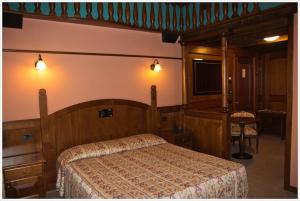 Un ou plusieurs lits dans un hébergement de l'établissement Hotel California