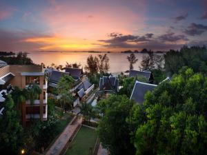 an aerial view of a resort on the water at sunset at Amari Vogue Krabi in Tab Kaek Beach