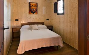 Säng eller sängar i ett rum på Camping Carlos III