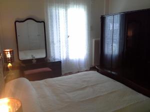 Ένα ή περισσότερα κρεβάτια σε δωμάτιο στο Apartment near the Beach