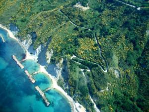 an aerial view of a river and the ocean at Camping Paradiso in Pesaro