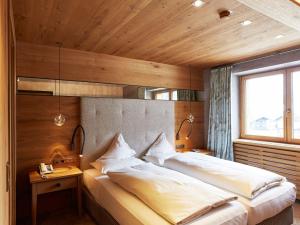 Postel nebo postele na pokoji v ubytování Hotel Auriga