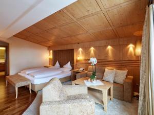 Postel nebo postele na pokoji v ubytování Hotel Auriga