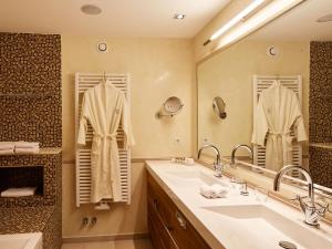 Koupelna v ubytování Hotel Auriga