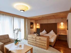 Postel nebo postele na pokoji v ubytování Hotel Auriga