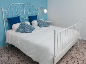 Cama ou camas em um quarto em Cefalù Caldura house