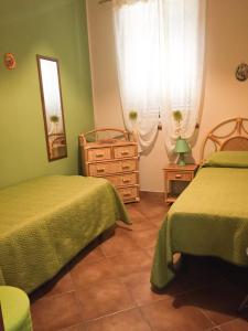 A bed or beds in a room at Villa Chiara