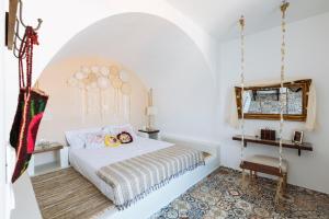 Gorgona Traditional 1 tesisinde bir odada yatak veya yataklar