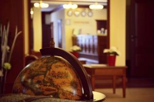 a globe sitting on top of a table in a room at Meridian in Saransk