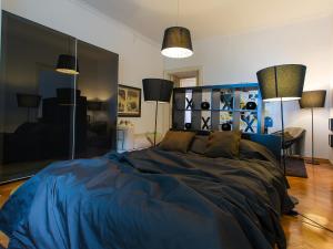 Łóżko lub łóżka w pokoju w obiekcie Valsabbion City Suite